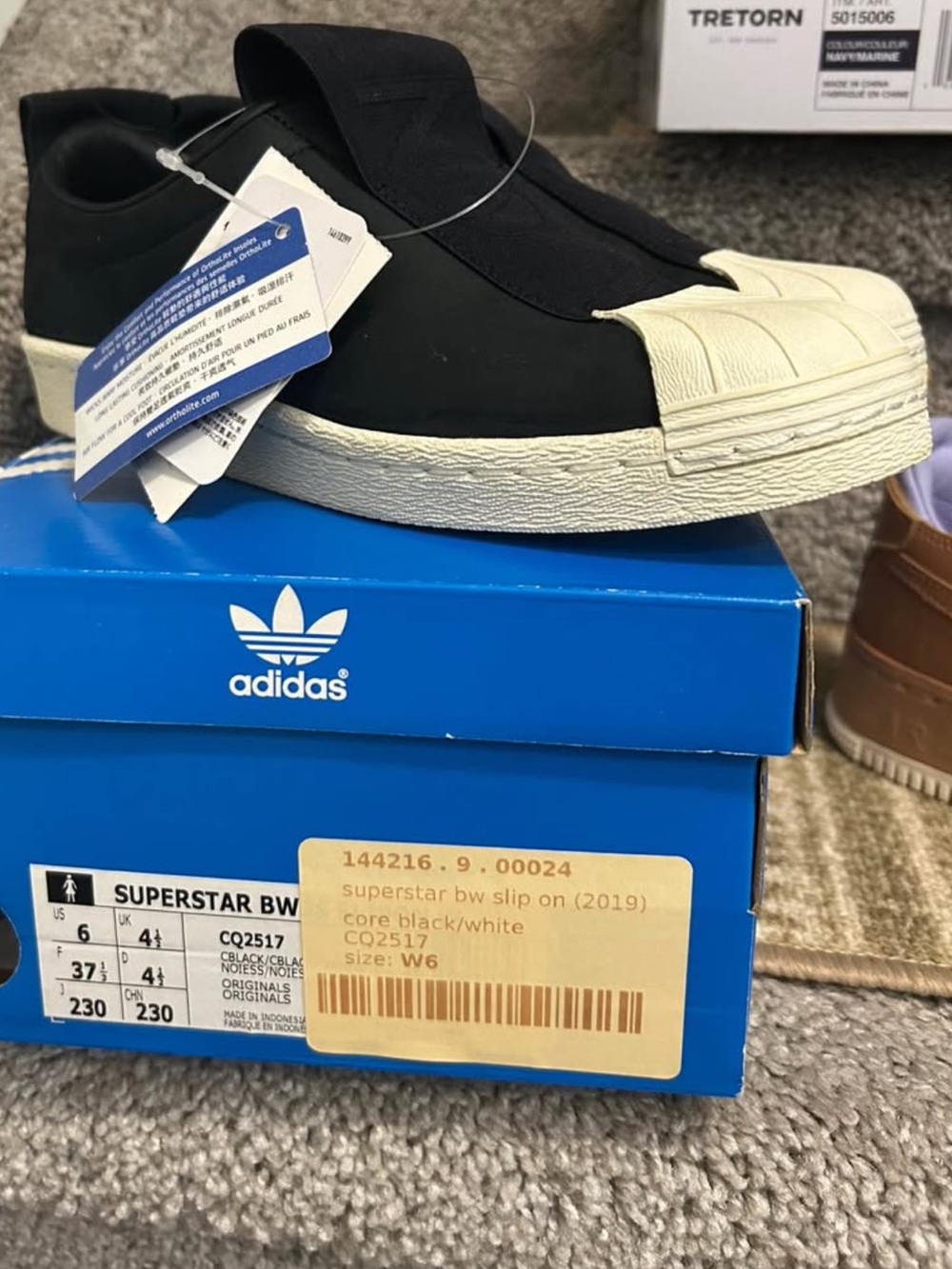 adidas Superstar Slip-On Sneakers in Black and White